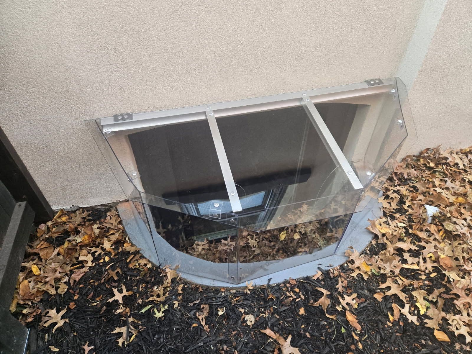 Keep Your Basement Dry with Our Custom Clear Window Well Covers image