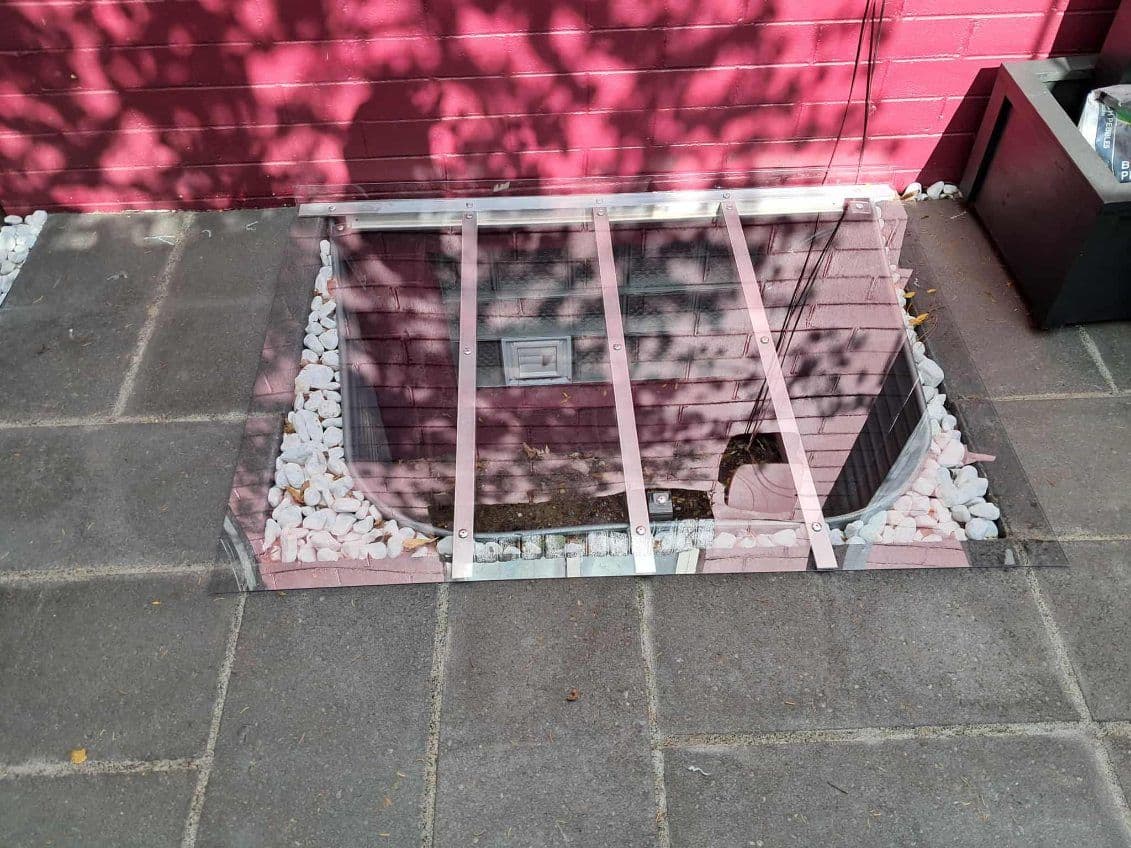 Sleek Low Profile Window Well Covers for Enhanced Safety image