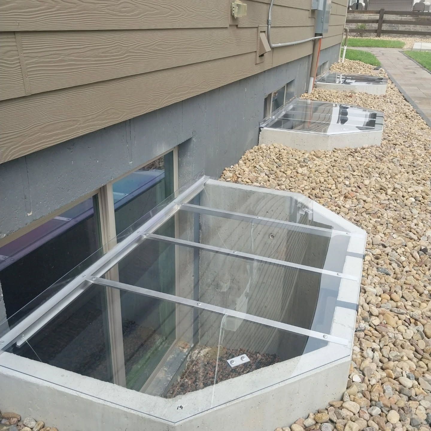 Protect Your Home with Stylish Window Well Covers image