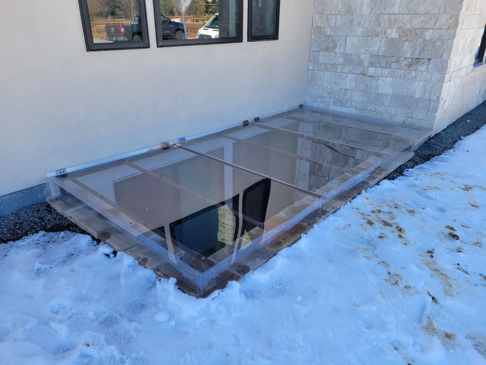 Project Boosting Home Brightness with New Window Well Covers image