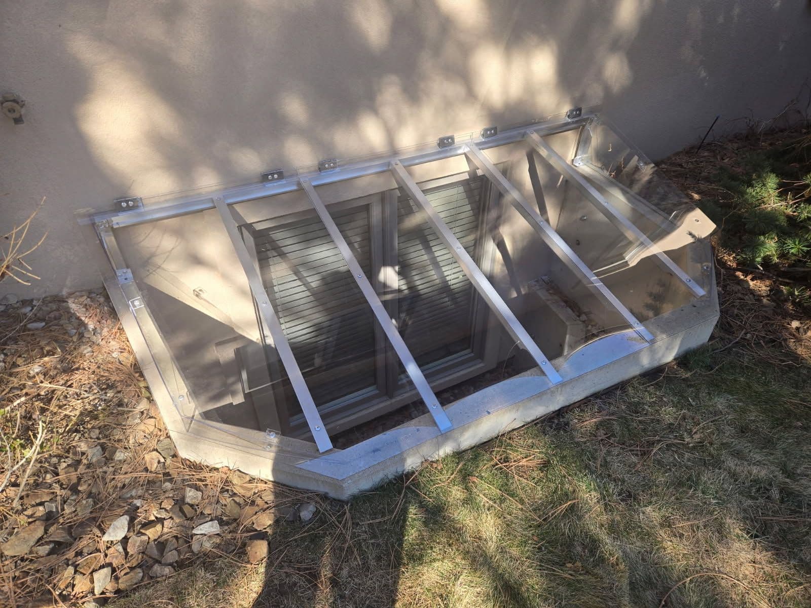 Enhance Your Home with Lean-To Style Window Well Covers image