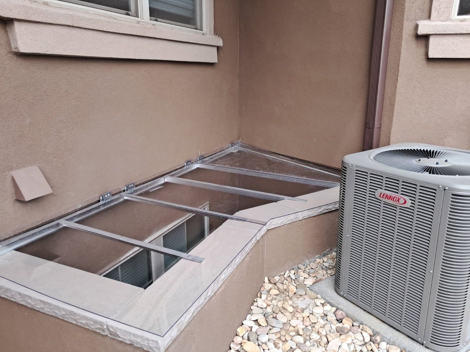 Custom Window Well Covers Enhance Home Safety and Appeal image