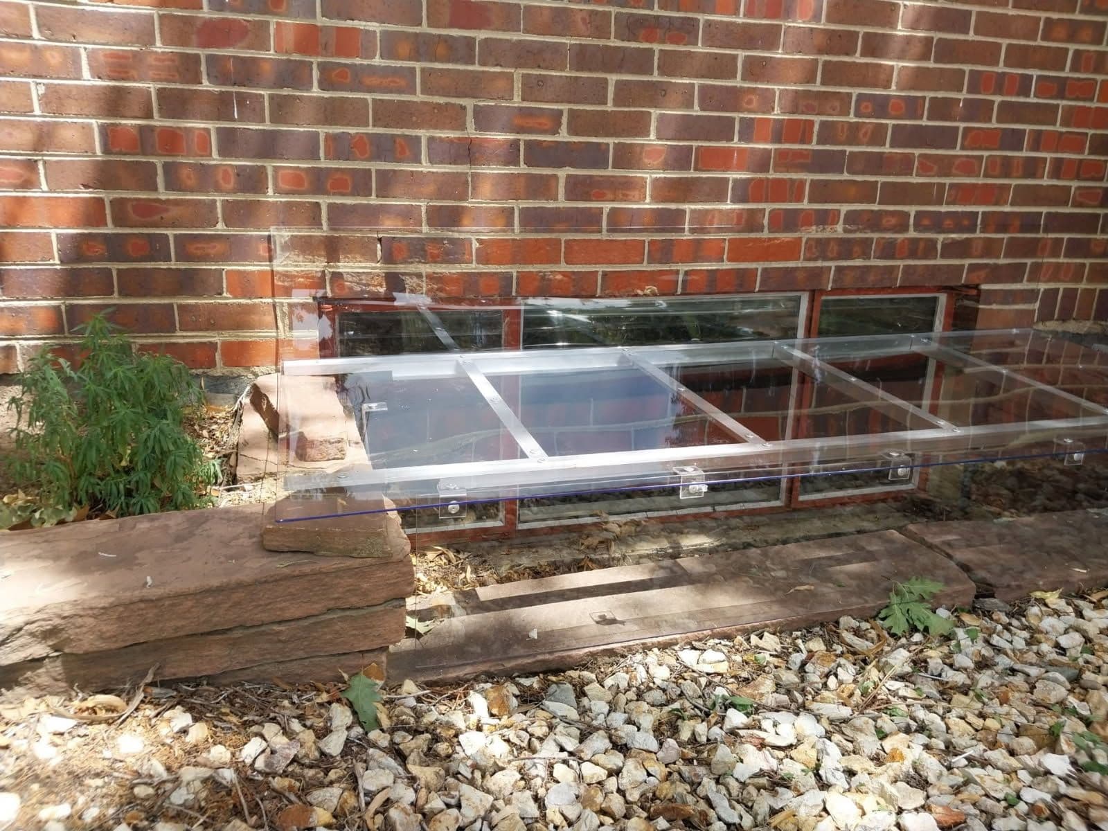 Custom Low Profile Window Well Covers Enhance Safety image